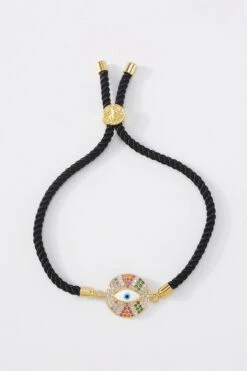 Eye Protect Round Black & Gold Bracelet